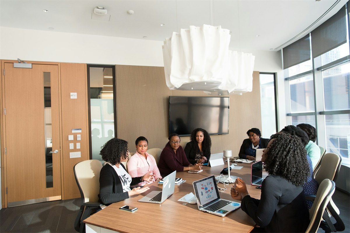 assets/mukunge-people/woc-room-meeting.jpg